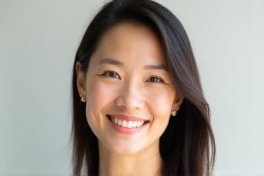 Professional headshot of Sarah Chen, a smiling woman with warm eyes, symbolizing empathy and expertise.